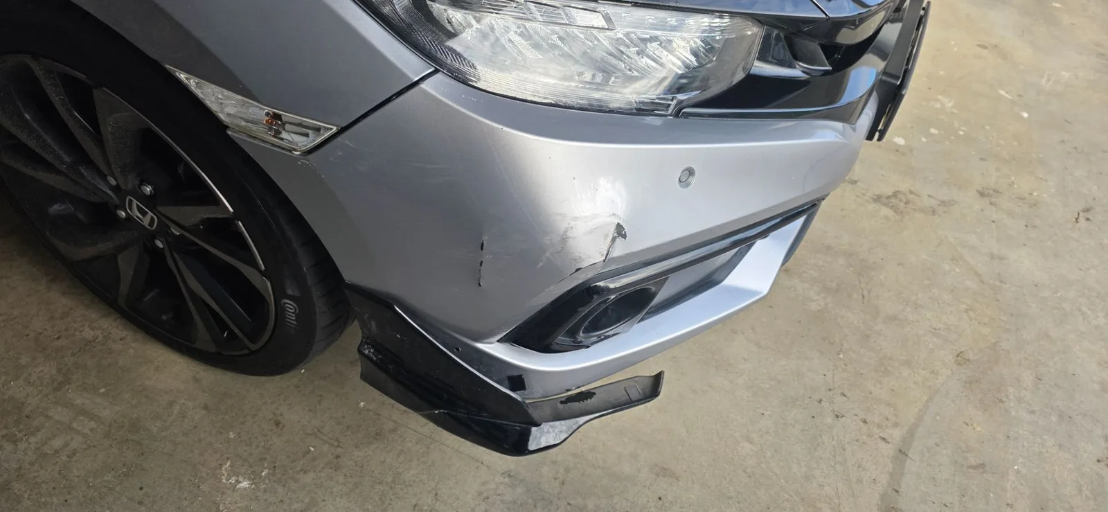 Car damage before repair - Civic Front Bumper Repair — Mickleham before professional scratch repair service